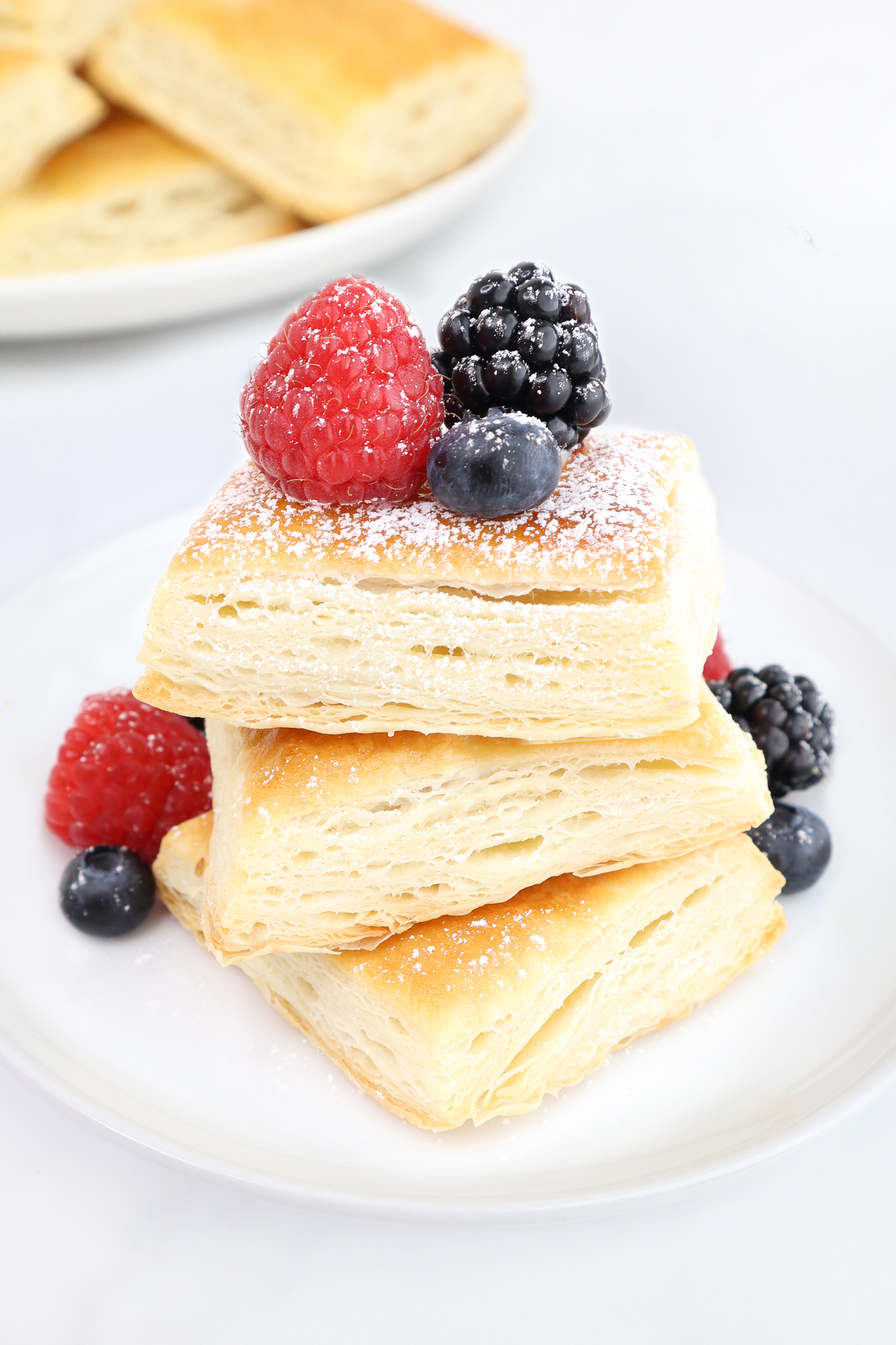 Fresh croissants cooling on a wire rack